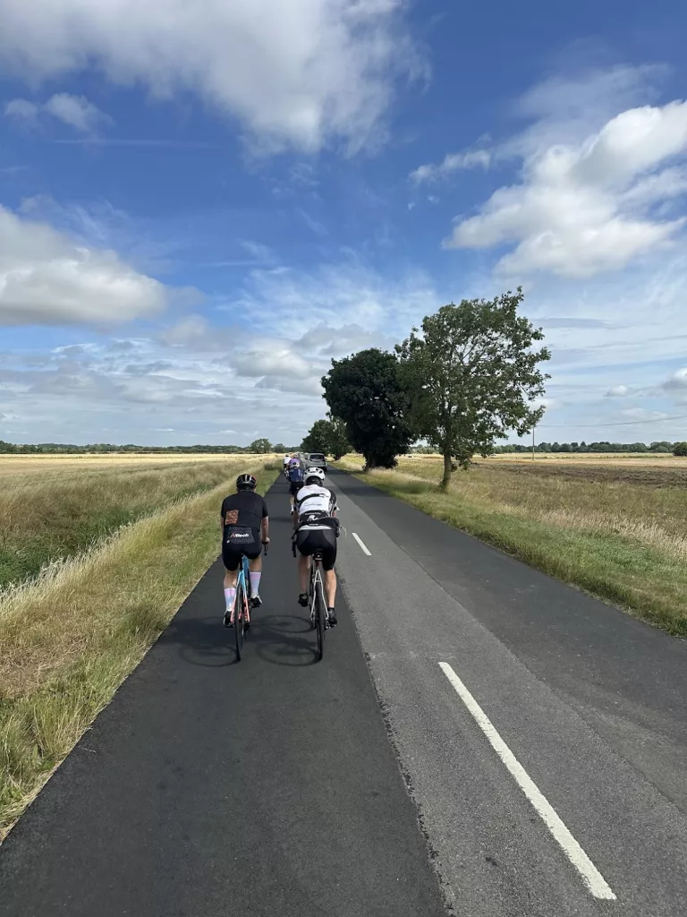 group ride on country road