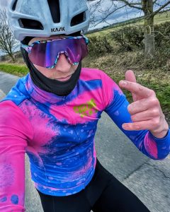 Cycling Punx bike rider wearing pink and blue jersey