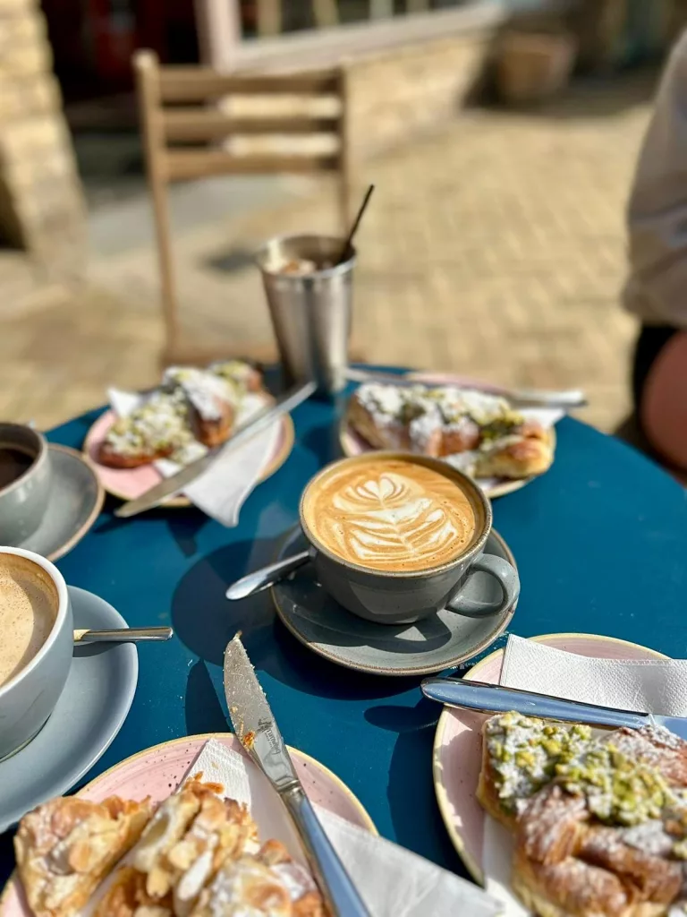 Coffee and cake on blue table