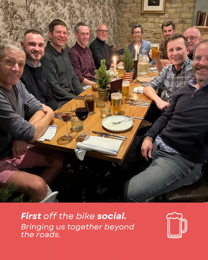 Cycling group sitting round a table in Bull and Swan Stamford enjoying dinner and drinks
