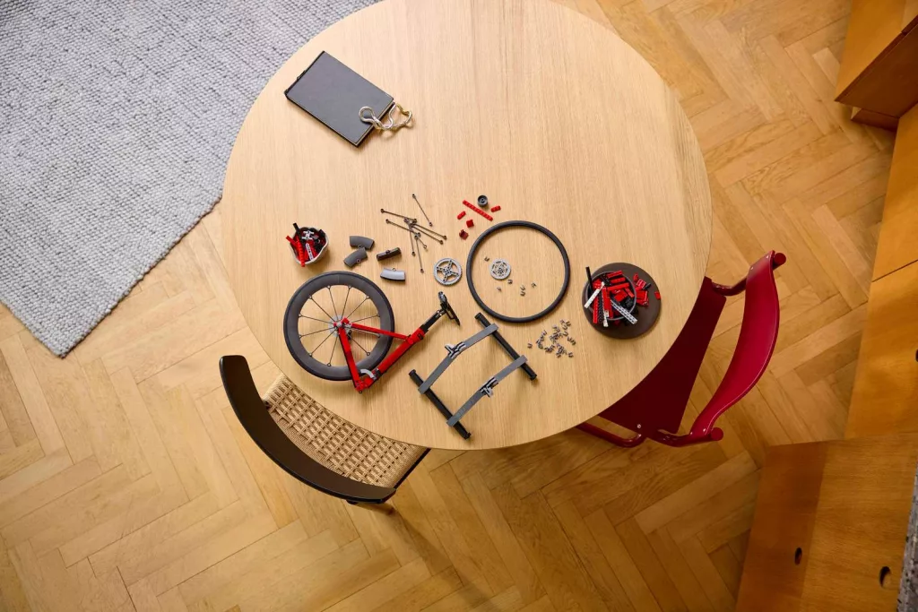 lego road bike being built on a table