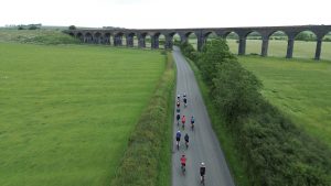 Stamford cycling riding under Harringworth viaduct