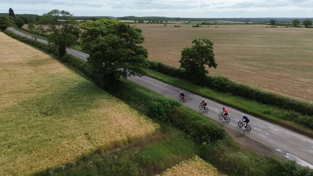 Stamford Cycling club riding out of Empingham, drone aerial image