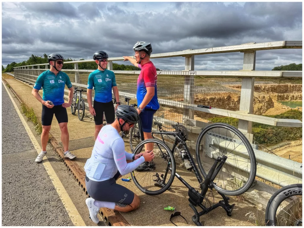 Repairing Will's puncture at the side of the road